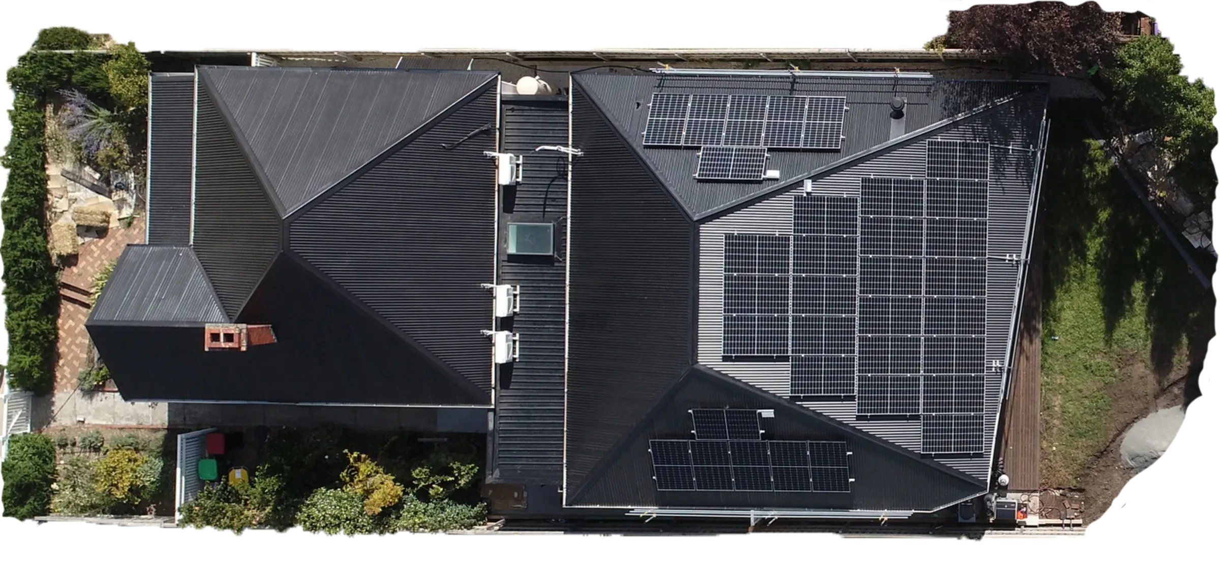 shot of house roof with solar panels from above